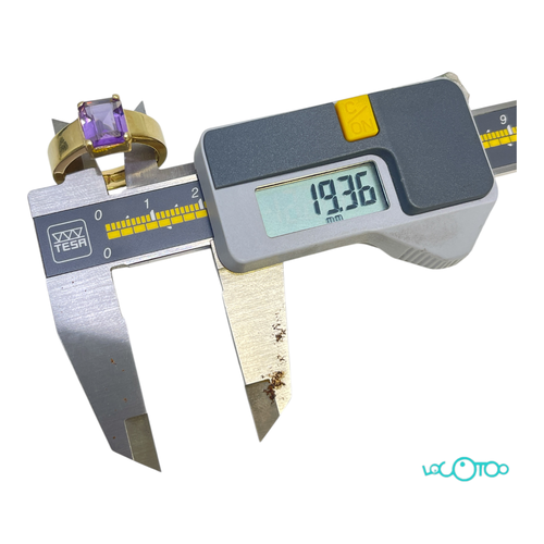 Anillo Oro 18Kt con piedra morada