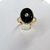 Anillo Oro 18k , ónix y diamante .peso 4,70